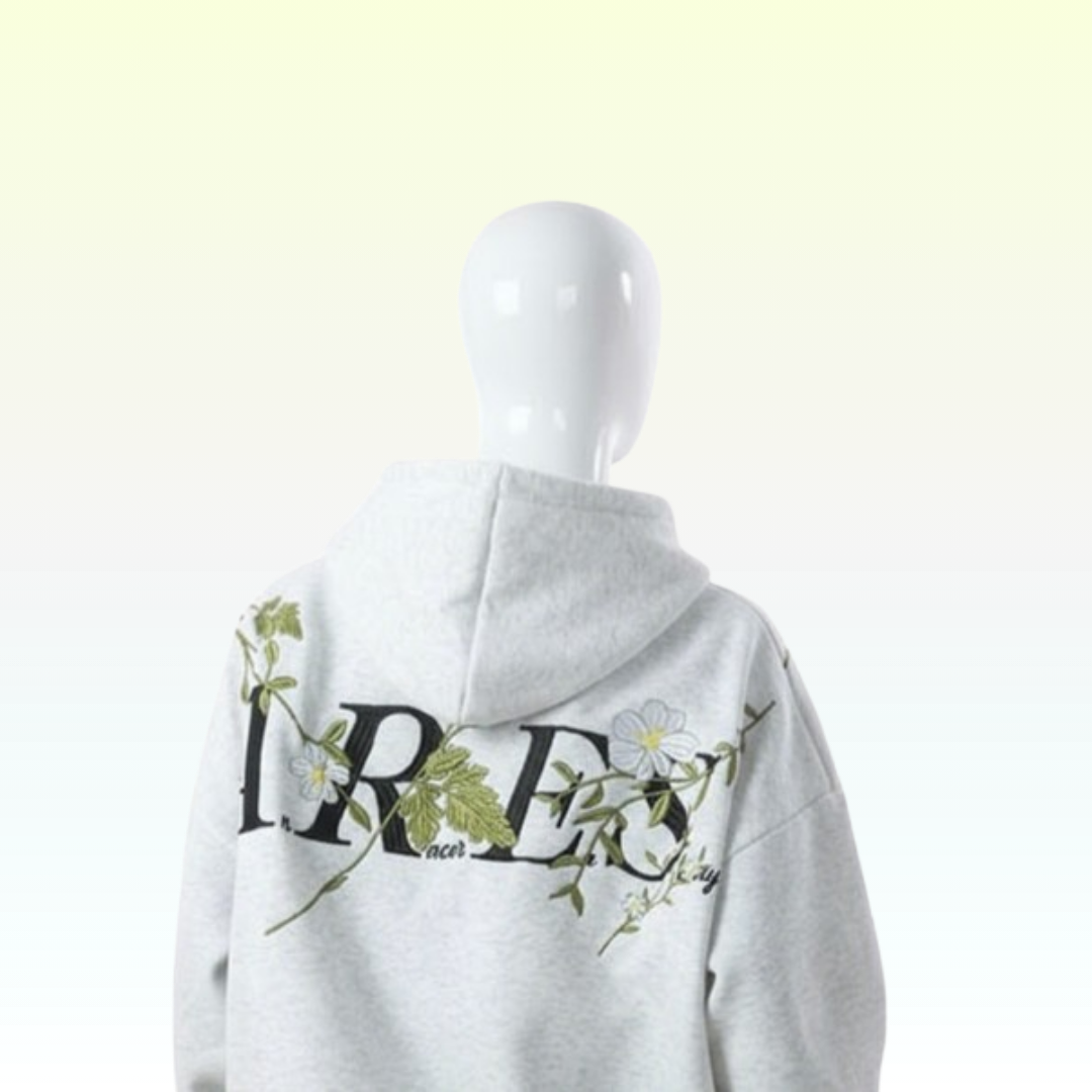 Gray hoodie with floral designs and text on a white background
